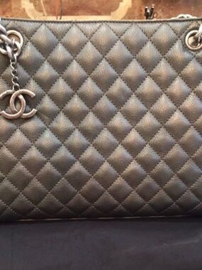CHANEL Quilted Shoulder Bag in Metallic Gray with CC Charm